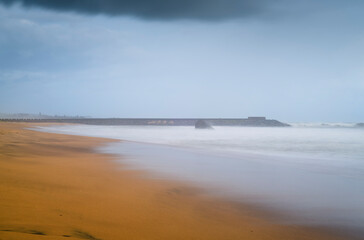 Breathtaking landscape scenery in the paradise island of Sri Lanka, long exposure sandy beach photograph.