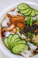 A delicious Chinese Guangxi dish, crispy pork soy sauce rice noodles, rice noodles