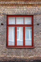 Fototapeta na wymiar Old wooden window with shutters inside the house.