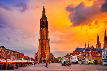 Fototapeten Dutch Travel Concepts. Protestant New Gothic Church (Nieuwe Kirche) on Markt Square in Dutch Old City Delft in Holland, the Netherlands. © danmorgan12