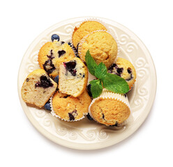 Plate with tasty blueberry muffins on white background