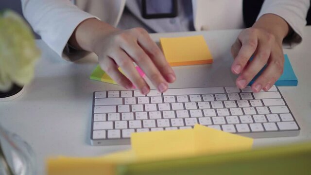 salary employee working at her desk in the office during office hours.