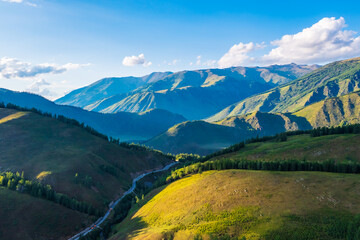 Fototapeta na wymiar Aerial View of mountain and green forest with grass in Kanas Scenic Area,Xinjiang,China.
