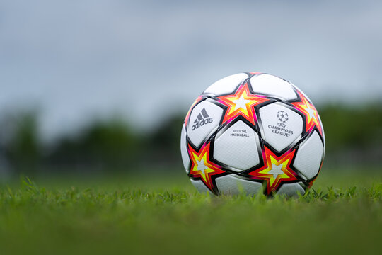 Thailand - July 2021: Adidas launch the new Uefa Champions League (UCL) official match ball name "Pyrostorm" in design of flame. This ball will use is group stage of season 2021-2022. Close-up object.
