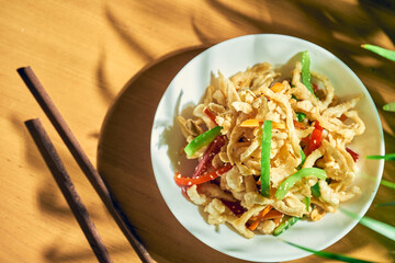 Deep fried spicy squid tempura with vegetables in Chinese style.