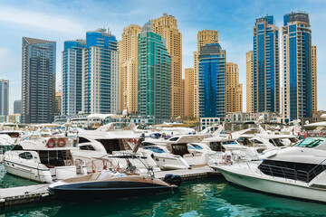 Naklejka premium Dubai Marina skyscrapers and port in Dubai, United Arab Emirates