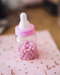 Baby shower decorations - pink bottle with edible sweets