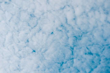 summer clouds in the sky above lake mjøsa, norway
