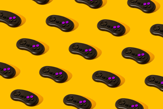 Joystick pattern on yellow background. Gamepad minimal creative concept. Gaming videogame controller. 3d render.
