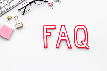 Information helpdesk concept with faq frequently asked questions text on working place