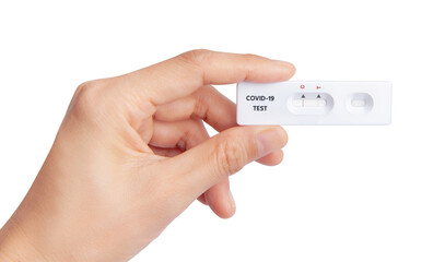 Hand holding Coronavirus Covid-19 laboratory self test Quick Antigen Detection Testing fast antibody point of care testing with Positive result