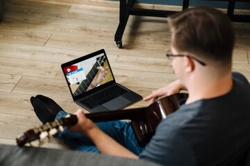White young man with down syndrome at home © Drobot Dean