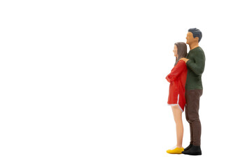 Miniature people couple in casual cloth standing together isolated on white background with clipping path.
