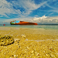 Photo of a shipwreck on the shore of Pangandaran, West Java - Indonesia