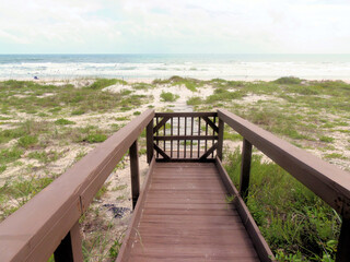 Fototapeta premium Private Beach Access in Ponce Inlet, FL to no drive beach meaning the beach is a playground for people
