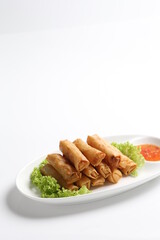 deep fried crispy vegetable spring roll with thai chilli sauce salad in white black  background dim sum snack halal menu