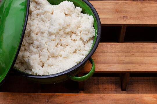 Traditional African Maize Meal In Rustic Green Pot