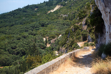 old cobblestone road in corfu mountains