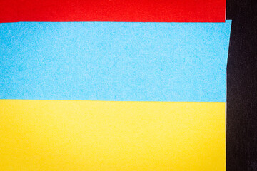 Multicolor background from a paper of different colors