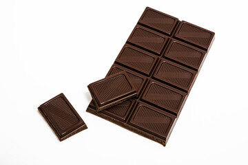 Tasty dark chocolate on white background