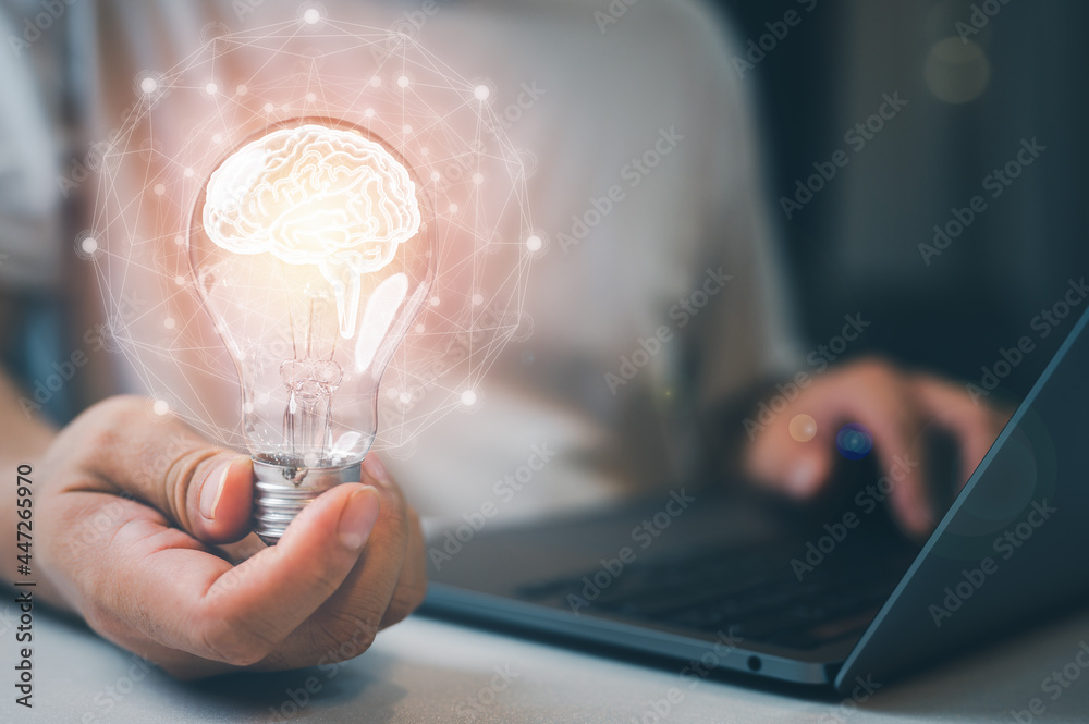 Aufkleber man holding light bulbs with brain inside and digital connection line outside. creative and innovati