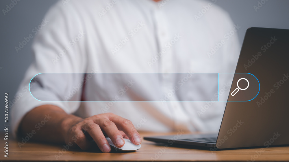 Fototapete SEO Data Search Technology Search Engine Optimization. man's hands are using a computer laptop to find what they are interested in. Searching for information with your website. internet networking.