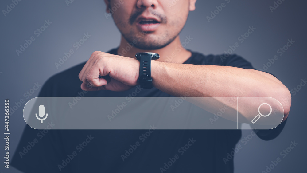 Leinwandbilder Voice assistance for searching in smart watch. Man talking to smartwatch for Searching for information. Using Search Console with your website. Data Search Technology Search Engine Optimization.