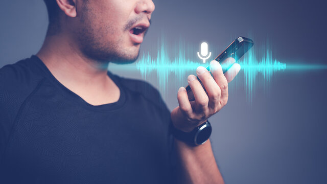 man using voice assistant on smartphone, talking to smartphone for Access to information and applications, Write a message and send a message.