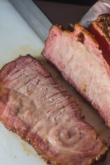 hump steak being sliced ​​with copy space