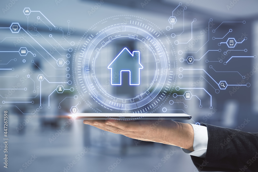 Aufkleber close up of businessman hand holding tablet with creative glowing house icon on blurry office backgr