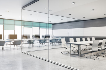 Modern concrete and glass meeting room office interior with furniture, equipment and daylight. 3D Rendering.