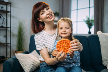 Childhood, games and leisure for kids. Modern antistress toy for children with concave and convex...