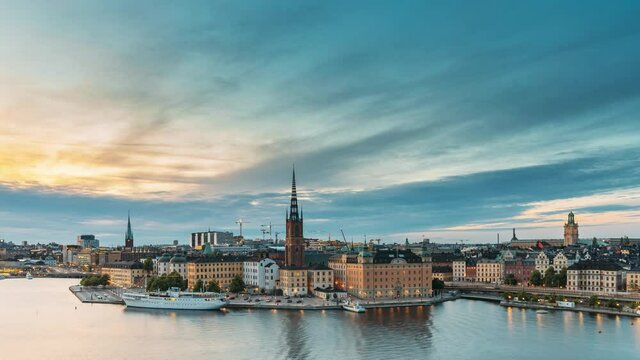 Stockholm, Sweden. Scenic Famous View Of Embankment In Old Town Of Stockholm At Summer. Gamla Stan In Summer Evening. Famous Popular Destination Scenic Place And UNESCO World Heritage Site