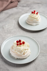 Pavlova is a meringue-based cake topped with fruit and whipped cream