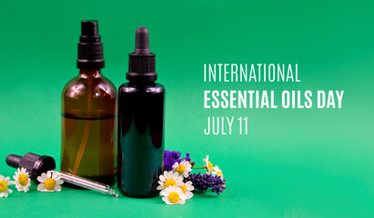 International Essential Oils Day stock images. Glass brown cosmetic bottles with flowers and herbs extract stock images. Essential Oils Day Poster, July 11. Important day