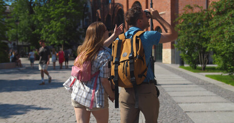 Couple of tourists exploring new city together