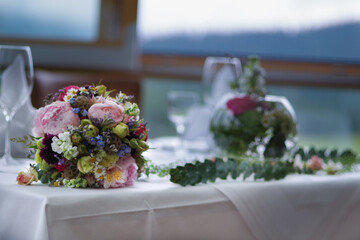 wedding bouquet on the table in a mountain house in South Bavaria Germany