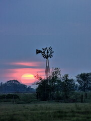 A Windmill at sunset near Cypress Rosehill Texas