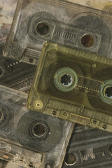 Vintage audio cassette tapes placed next to each other. Obsolete technology of audio recording and...