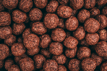 close up of a lot of chocolates balls 