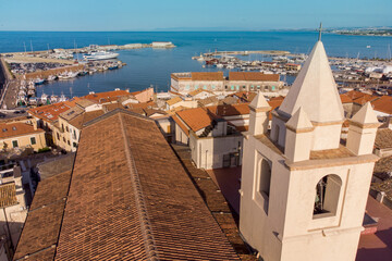 The panorama of Termoli town with the cathedral bell tower in the foreground and the port on the background , Termoli , Italy - obrazy, fototapety, plakaty