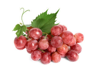 Cluster of ripe red grapes with green leaves on white background