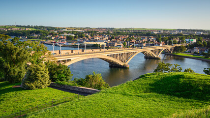 Elevated view of Royal Tweed Bridge in Berwick. Berwick upon Tweed is the most northerly town in England and is located in Northumberland at the mouth of the River Tweed just below the Scottish border