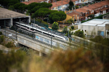 a train getting out of a tunnel with Tilt-Shift effect