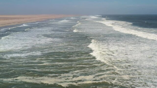 Flight over the Atlantic ocean on Skeleton Coast
