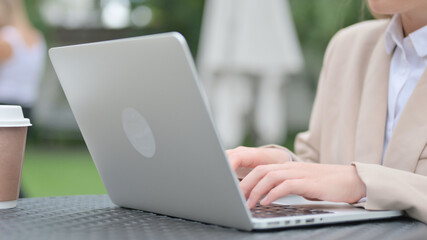 Hands Close up of Businesswoman Typing on Laptop Keyboard