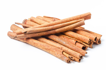 Cinnamon sticks on white.