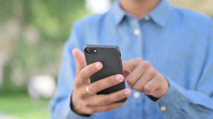 Hands Close Up of Woman Browsing Smartphone 