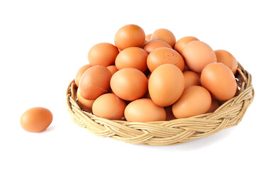Fresh eggs in the basket isolated on white background