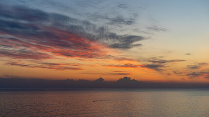 seascape with a beautiful sunset on the background of the sea